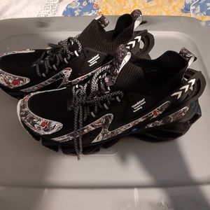 Never worn Revolution shoes
